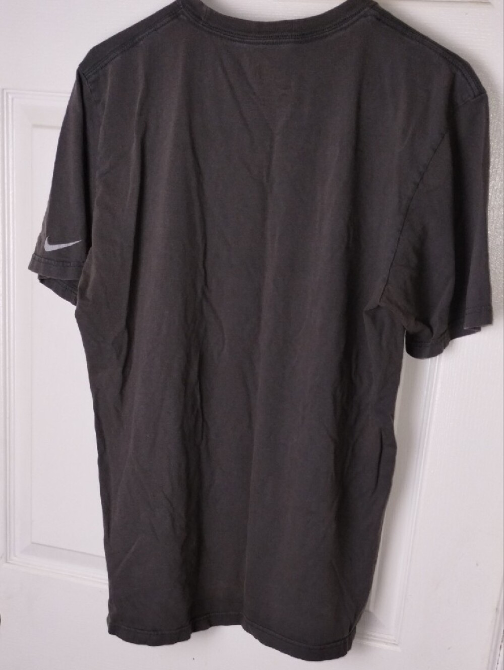 Nike Black Short-Sleeve Tee with Silver Swoosh Cutout.Large - Picture 6 of 8